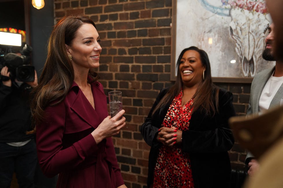 britains catherine, princess of wales l speaks with tv presenter alison hammond c during a visit to the rectory in birmingham on april 20, 2023, where she met future leaders and local business owners from birminghams creative industries sector the rectory sits on the edge of the jewellery quarter, a hub for artistic businesses in the city which produces up to 40 of all jewellery made in the uk photo by jacob king pool afp photo by jacob kingpoolafp via getty images