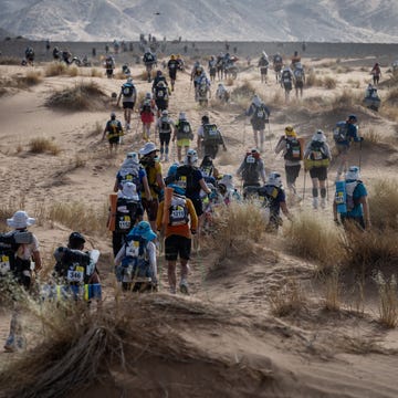 MARATHON-MOROCCO-SABLES competitors take part in stage 5 of the 37th edition of the marathon des sables between jdaid and kourci dial zaid in the moroccan sahara desert, near merzouga central morocco, on april 28, 2023. the 37th edition of the marathon is a live stage 250 kilometres race through a formidable landscape in one of the worlds most inhospitable climates. (photo by jean philippe ksiazek / afp) (photo by jean philippe ksiazek/afp via getty images)