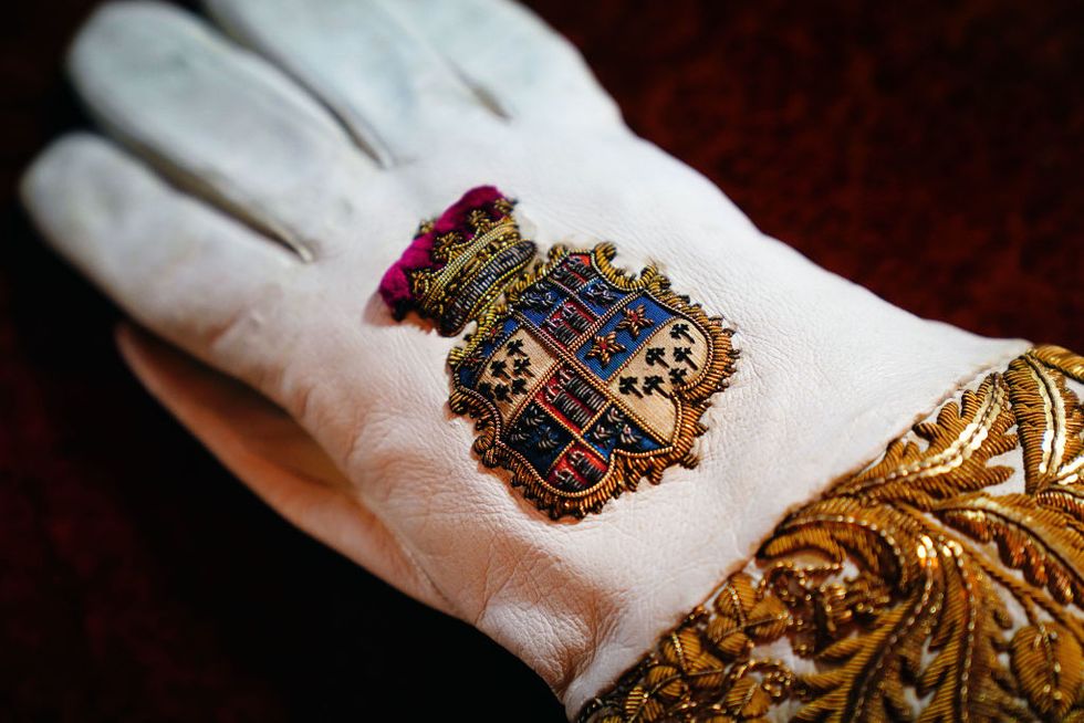 london, england may 01 embargoed to 2200 bst monday may 1 the coronation gauntlet glove, which forms part of the coronation vestments, is displayed in the throne room at buckingham palace on may 1, 2023 in london, england the vestments will be worn by king charles iii during his coronation at westminster abbey on may 6 photo by victoria jones poolgetty images