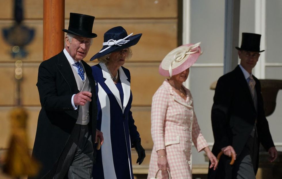 britains king charles iii l and britains camilla, queen consort 2nd l arrive to meet the guests attending the garden party at buckingham palace, in london, on may 3, 2023 to celebrate their coronation ceremony as king and queen of the united kingdom and commonwealth realm nations, on may 6, 2023 photo by yui mok pool afp photo by yui mokpoolafp via getty images