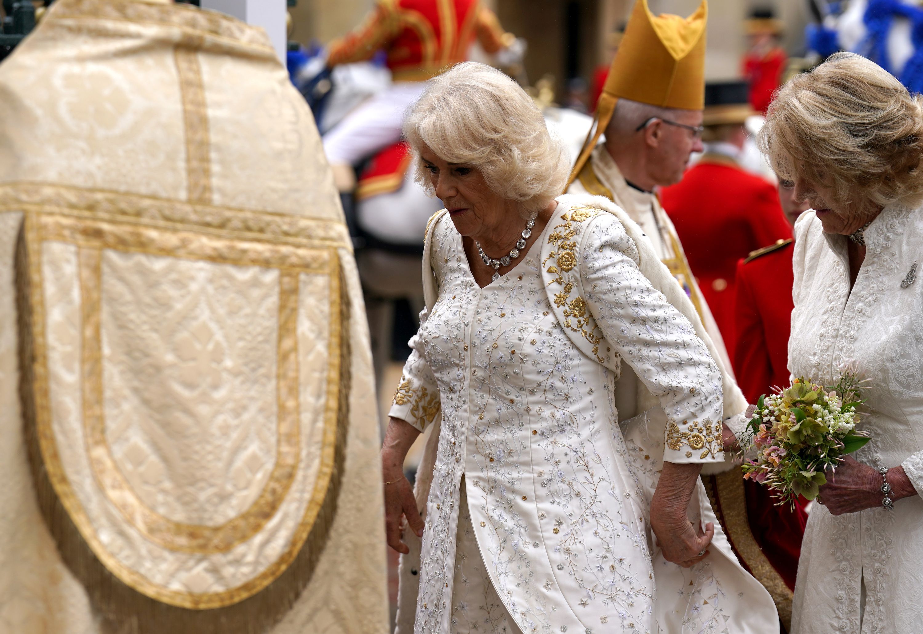 Queen Camilla's coronation outfit explained: robe, dress | Flipboard