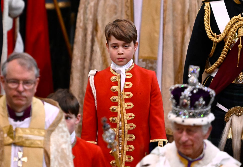 topshot page of honour prince george of wales and britains king charles iii wearing the imperial state crown leave westminster abbey after the coronation ceremonies in central london on may 6, 2023 the set piece coronation is the first in britain in 70 years, and only the second in history to be televised charles will be the 40th reigning monarch to be crowned at the central london church since king william i in 1066 outside the uk, he is also king of 14 other commonwealth countries, including australia, canada and new zealand photo by gareth cattermole pool afp photo by gareth cattermolepoolafp via getty images