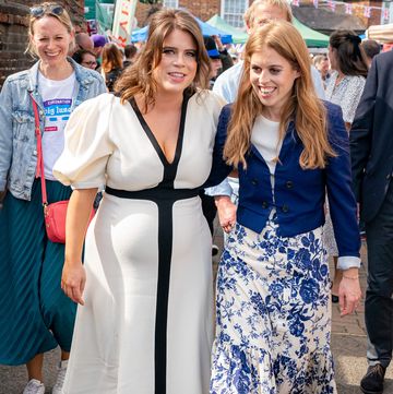chalfont st giles, england may 07 princess beatrice of york r and princess eugenie of york attend a coronation big lunch in chalfont st giles, buckinghamshire on may 7, 2023 in chalfont st giles, england people around the uk are celebrating with street parties after charles iii and his wife, camilla, were crowned as king and queen of the united kingdom of great britain and northern ireland, and the other commonwealth realms the coronation took place yesterday at westminster abbey eight months after charles acceded to the throne on 8 september 2022, on the death of his mother, elizabeth ii photo by wpa poolgetty images