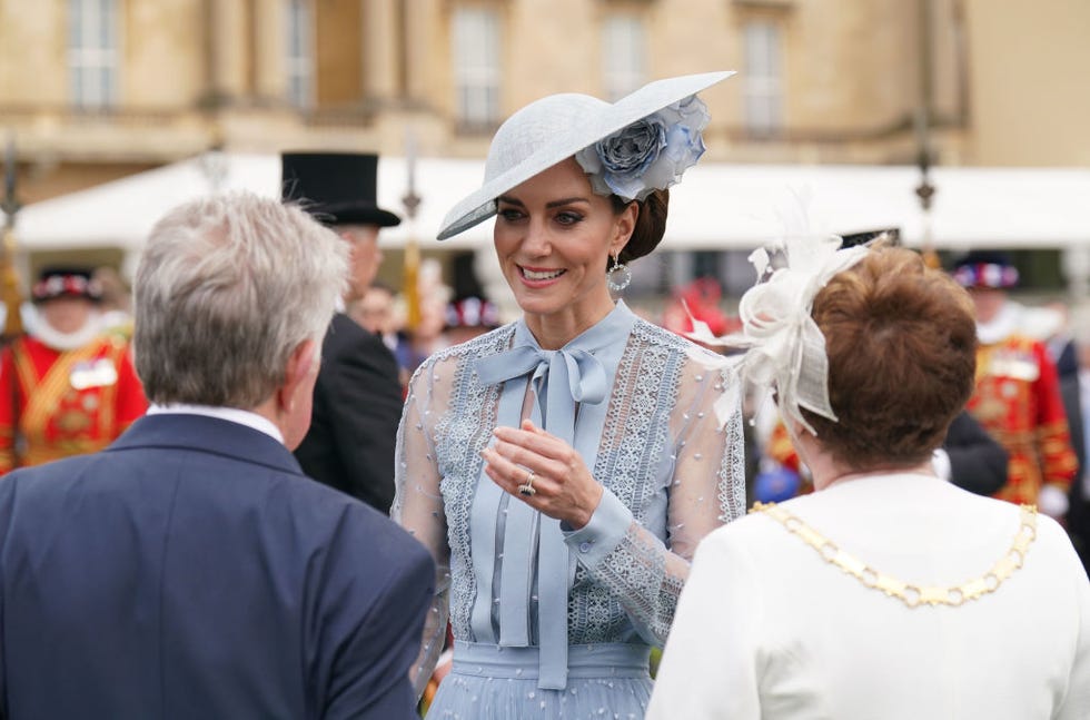 london, england may 09 catherine, princess of wales talks to guests during a garden party at a celebration of the coronation at buckingham palace, on may 9, 2023 in london, england jonathan brady wpa poolgetty images