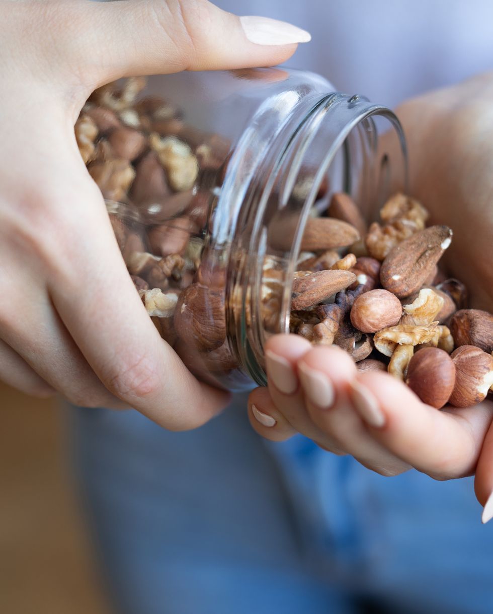 nuts in woman hands