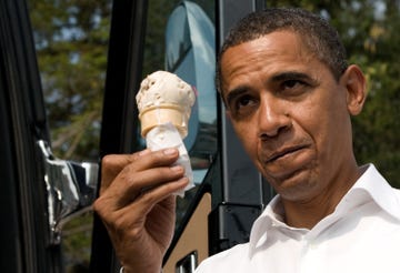 democratic presidential candidate senator barack obama eats an ice cream cone while preparing to board his bus at the windmill ice cream shop in aliquippa, pennsylvania, august 29, 2008, while campaigning with us vice presidential nominee senator joe biden afp photosaul loeb photo by saul loeb  afp photo by saul loebafp via getty images
