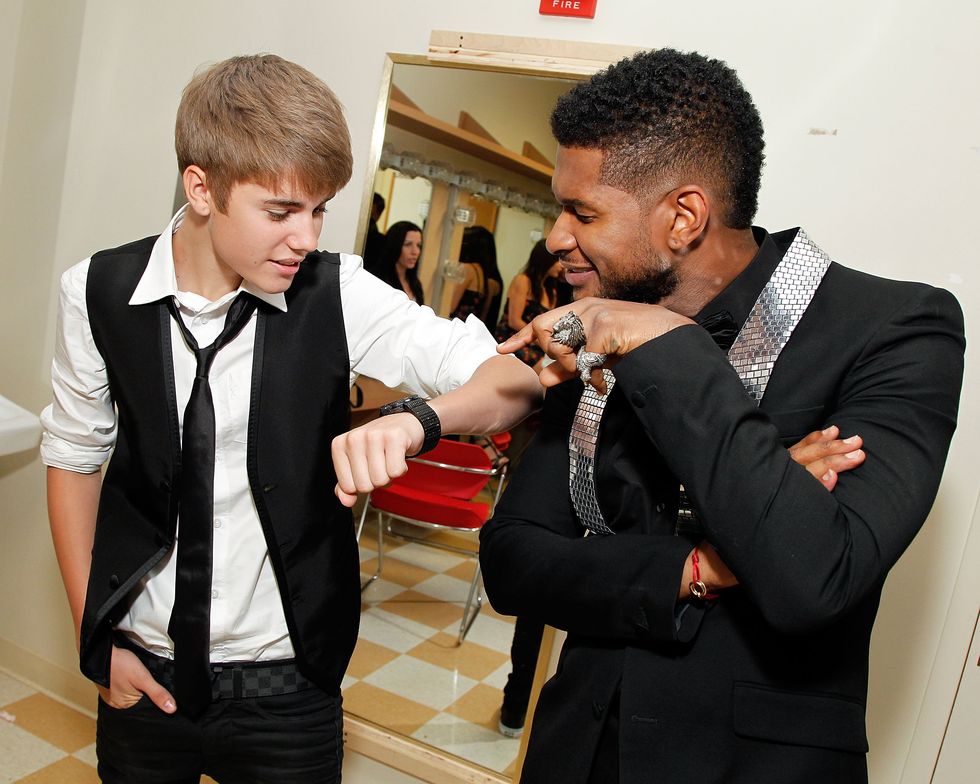atlanta, ga september 17 exclusive coverage musician and 2011 horizon award recipient justin bieber poses with musician usher raymond backstage at the 33rd annual georgia music hall of fame awards at the cobb energy performing arts center on september 17, 2011 in atlanta, georgia photo by ben rosewireimage
