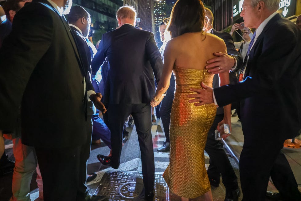 new york, united states may 16 duchess of sussex meghan markle and duke of sussex prince harry attend the ceremony, which benefits the ms foundation for women and feminist movements, in new york, united states on may 16, 2023 meghan markle who wears a gold dress for women of vision gala receives 2023 women of vision award from gloria steinem at ziegfeld ballroom on tuesday night in new york city photo by selcuk acaranadolu agency via getty images