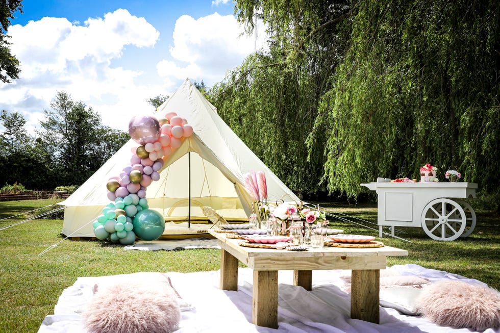 bell tent and birthday cakes for party