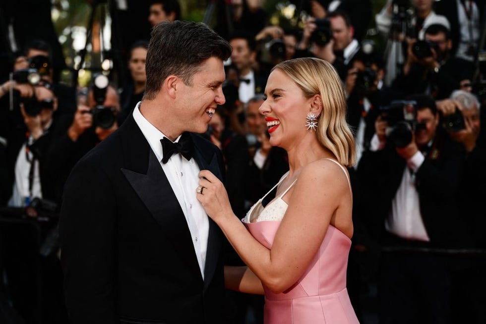 us actress scarlett johansson r and us comedian colin jost arrive for the screening of the film asteroid city during the 76th edition of the cannes film festival in cannes, southern france, on may 23, 2023 photo by christophe simon afp photo by christophe simonafp via getty images