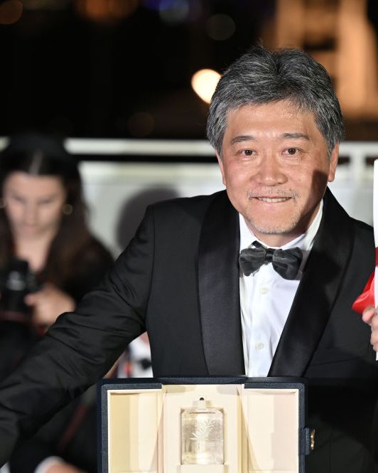 cannes, france may 27 japanese director kore eda hirokazu poses with the trophy during a photocall after he accepted the best screenplay prize for the film kaibutsu monster on behalf of japanese writer sakamoto yuji during the closing ceremony of the 76th cannes film festival at palais des festivals in cannes, france on may 27, 2023 photo by mustafa yalcinanadolu agency via getty images