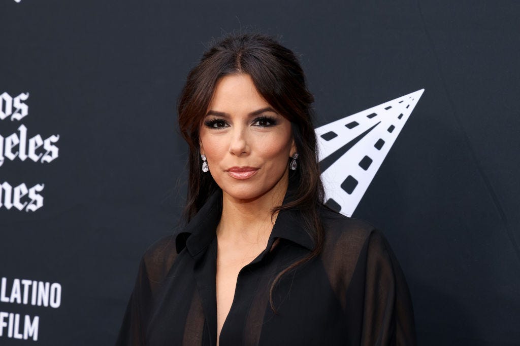 Eva Longoria Is Chic in a Sheer Black Dress With a High Leg Slit