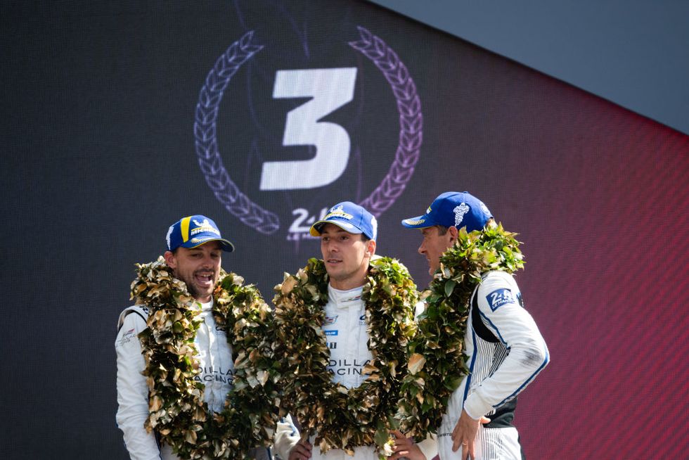le mans, france june 11 the podium l to r earl bamber of new zealand, alex lynn of great britain, richard westbrook of great britain 02 cadillac racing, third, at the 100th anniversary of the 24 hours of le mans at the circuit de la sarthe on june 11, 2023 in le mans, france photo by james moy photographygetty images