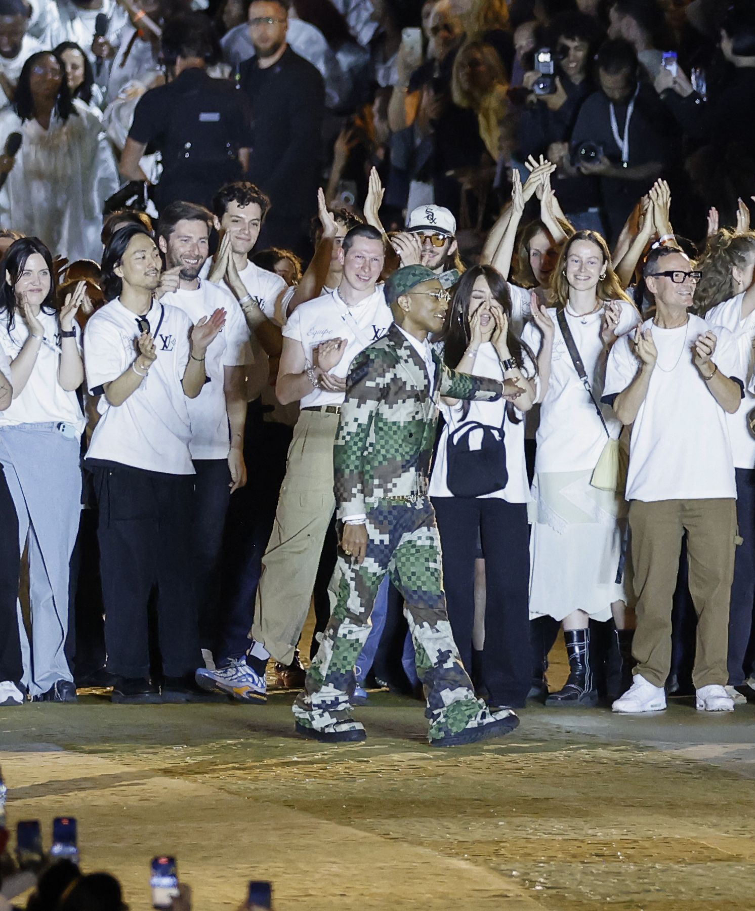 Pharrell Williams Makes Louis Vuitton Debut With Star-Studded
