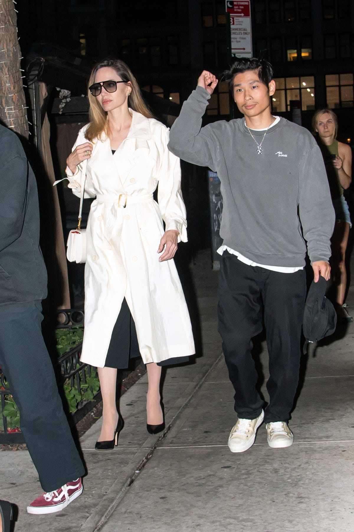 Angelina Jolie Is Classic in a Black Dress and White Trench