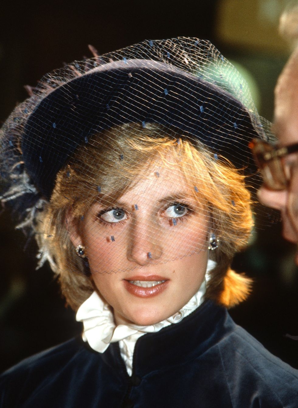 birmingham, england   february 08 diana, princess of wales, wearing a blue velvet suit with a mandarin collar designed by caroline charles and a veiled hat by john boyd, visits the international spring fair at the national exhibition centre on february 8, 1983 in birmingham, united kingdom photo by anwar husseingetty images