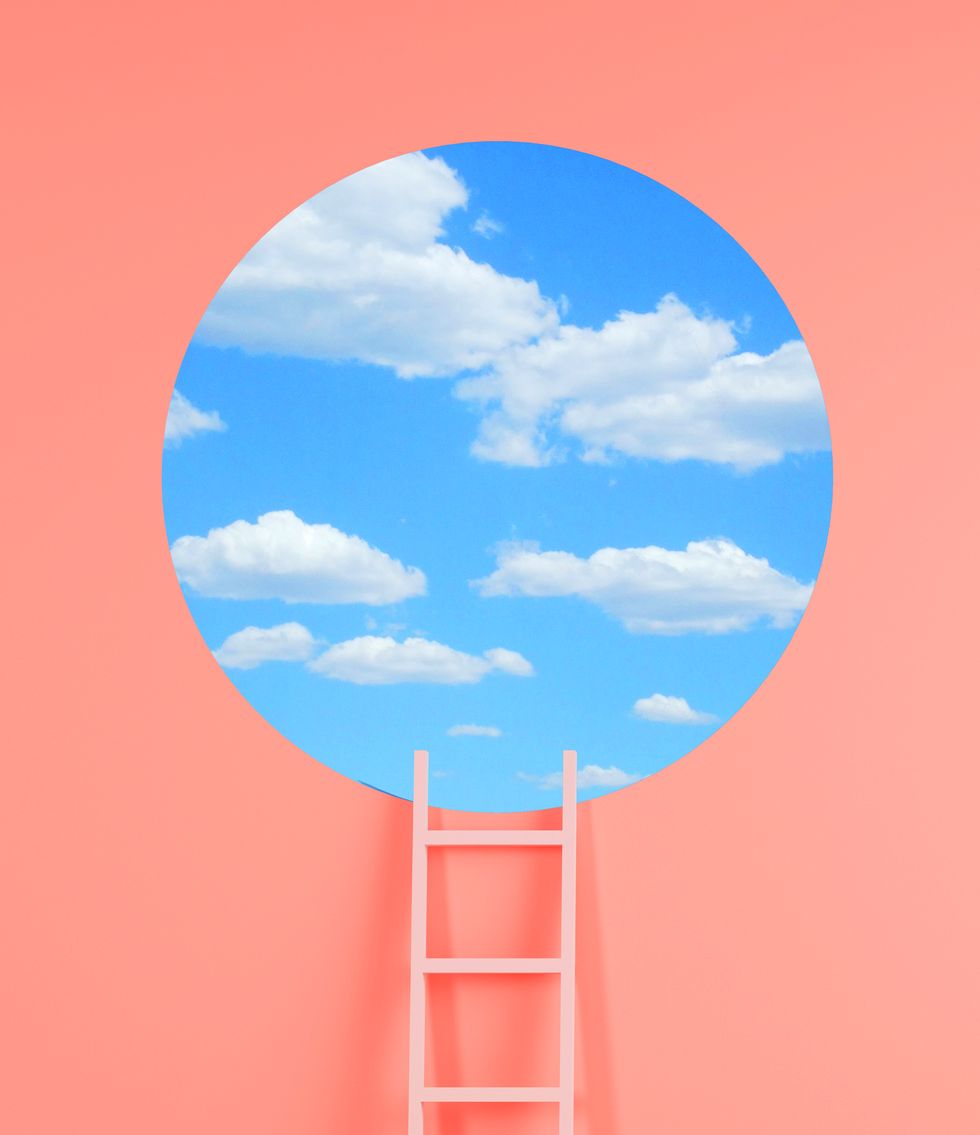 a ladder leading up to a circle cut out of clouds