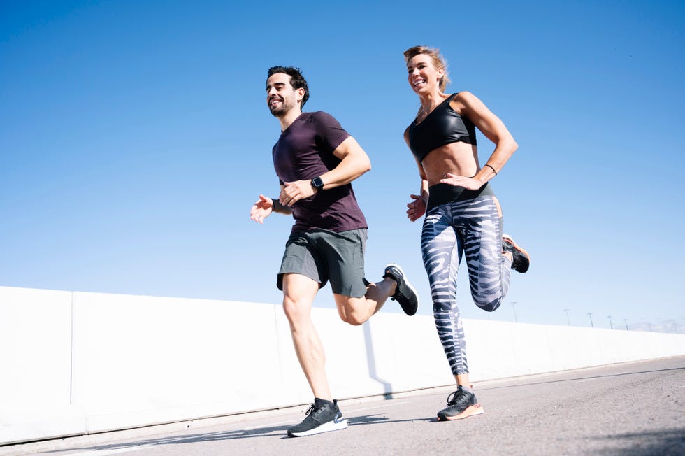 a man and a woman running