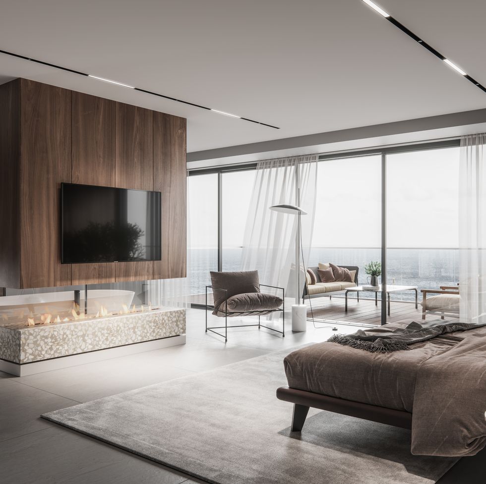 interior of a bedroom with fireplace and tv on wall 3d rendering of a luxurious master bedroom interior with large windows