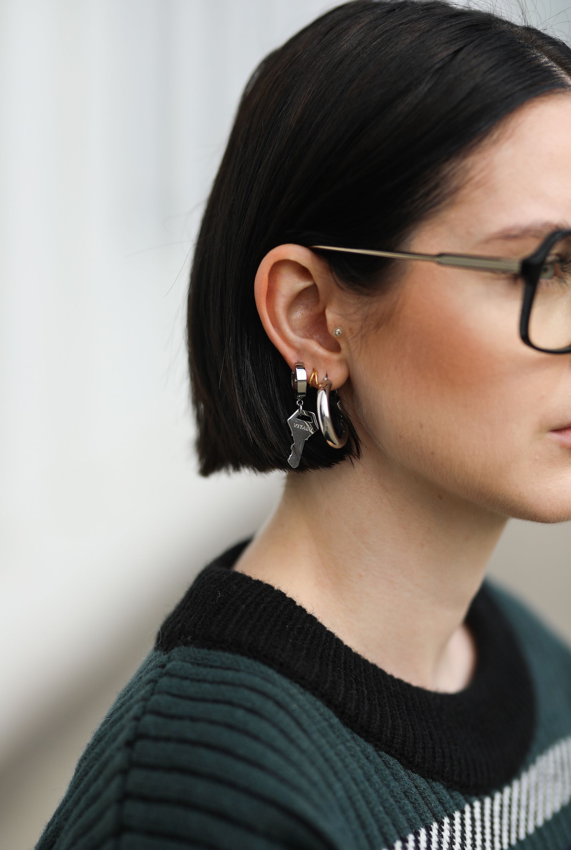 dusseldorf, germany   august 15 maria barteczko wearing holzweiler black wool sweater, vitaly silver key earring and victoria beckham black oversized glasses on august 15, 2020 in dusseldorf, germany photo by jeremy moellergetty images