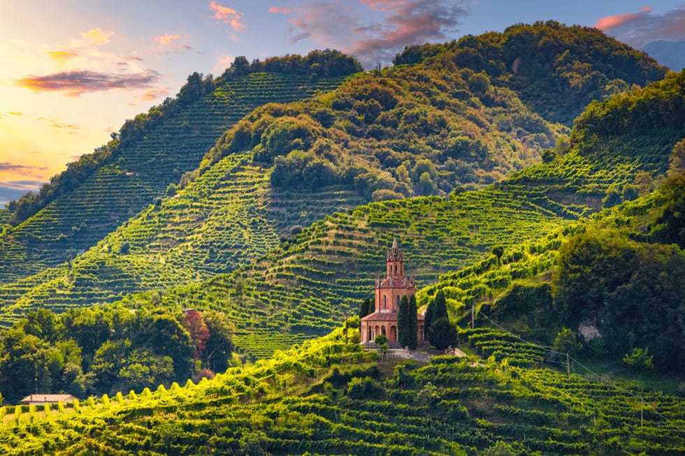Amazing ways to experience Italy farra di soligo col san martino church of san martino prosecco hills at sunset
