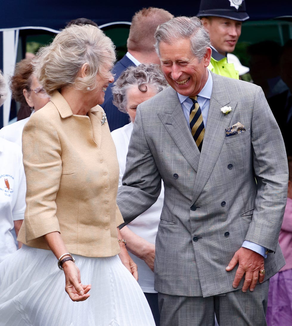 prince charles, prince of wales looks on at camilla, duchess of cornwall