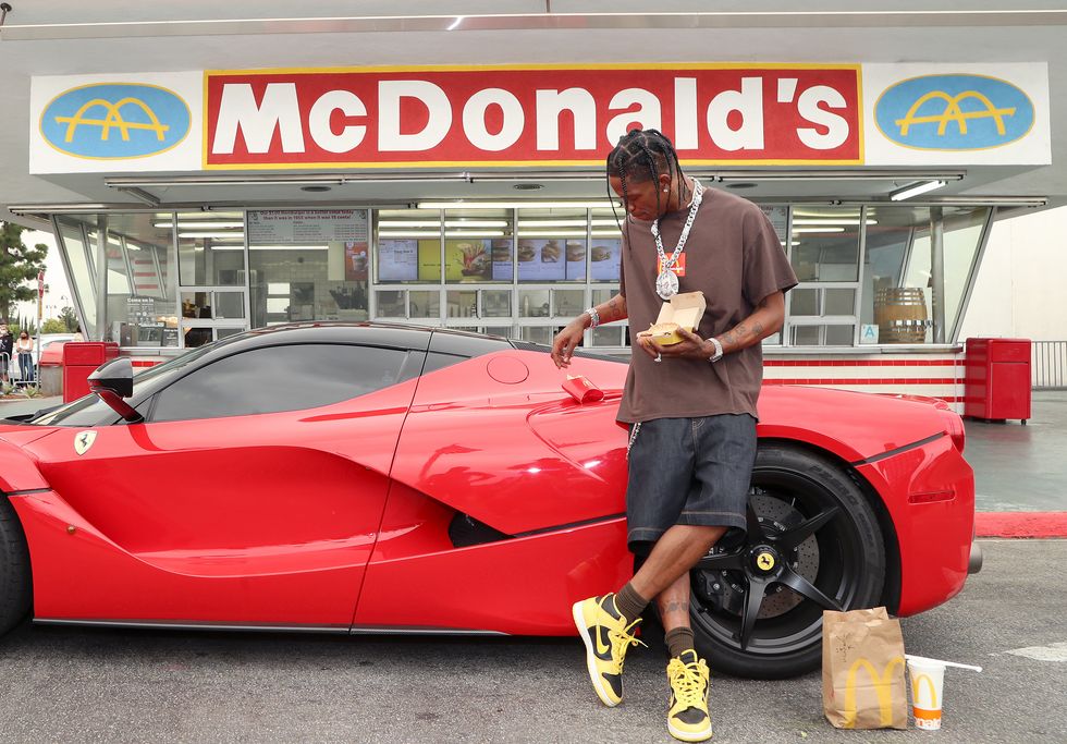 downey, california   september 08  travis scott surprises crew and customers at mcdonalds for the launch of the travis scott meal on september 08, 2020 in downey, california photo by jerritt clarkgetty images for mcdonalds