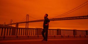 san francisco, ca   september 9 a person who did not want to give his name contemplates the view from embarcadero as smoky skies from the northern california wildfires casts a reddish color during the morning in san francisco, calif, on wednesday, sept 9, 2020 photo by ray chavezmedianews groupthe mercury news via getty images