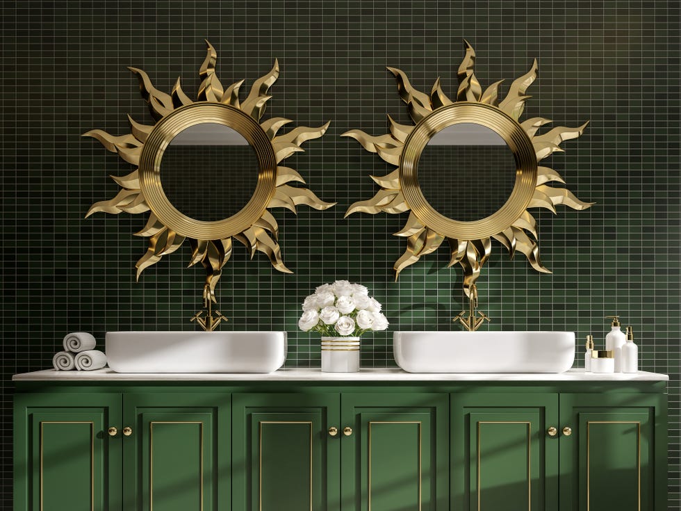 modern classical style bathroom 3d render,the room has green mosaic walls tile and green wood cabinets with white marble top decorate with golden sun shape mirror frames