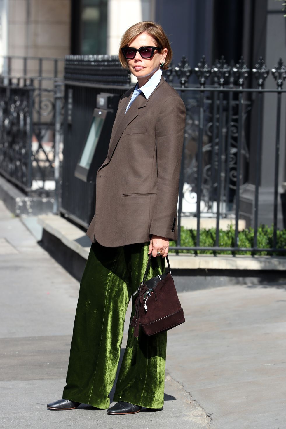 london, england   september 21  guest wearing green velvet trousers, suit jacket, sunglasses attends a osman presentation at the mandrake hotel on september 21, 2020 in london, england photo by neil mockfordgetty images