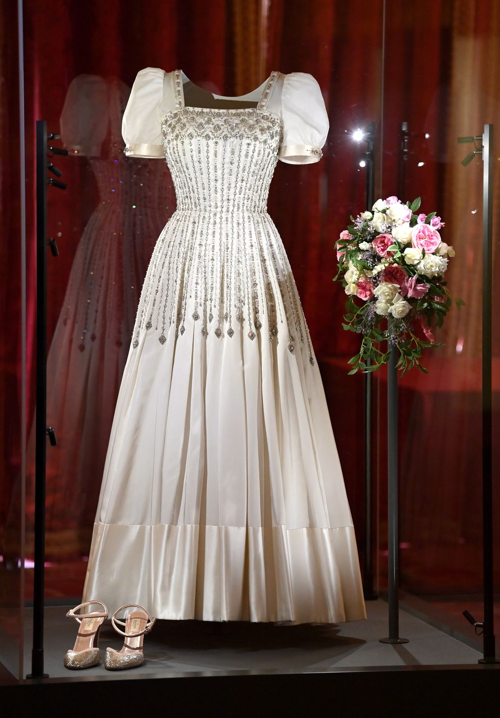 windsor, england   september 23 hrh princess beatrice of yorks wedding dress on display at windsor castle on september 23, 2020 in windsor, england princess beatrice and edoardo mapelli mozzi married on july 18, 2020 in windsor the wedding dress, first worn by her majesty the queen in the 1960s, will go on public display at windsor castle from thursday, 24 september 2020 photo by karwai tangwireimage