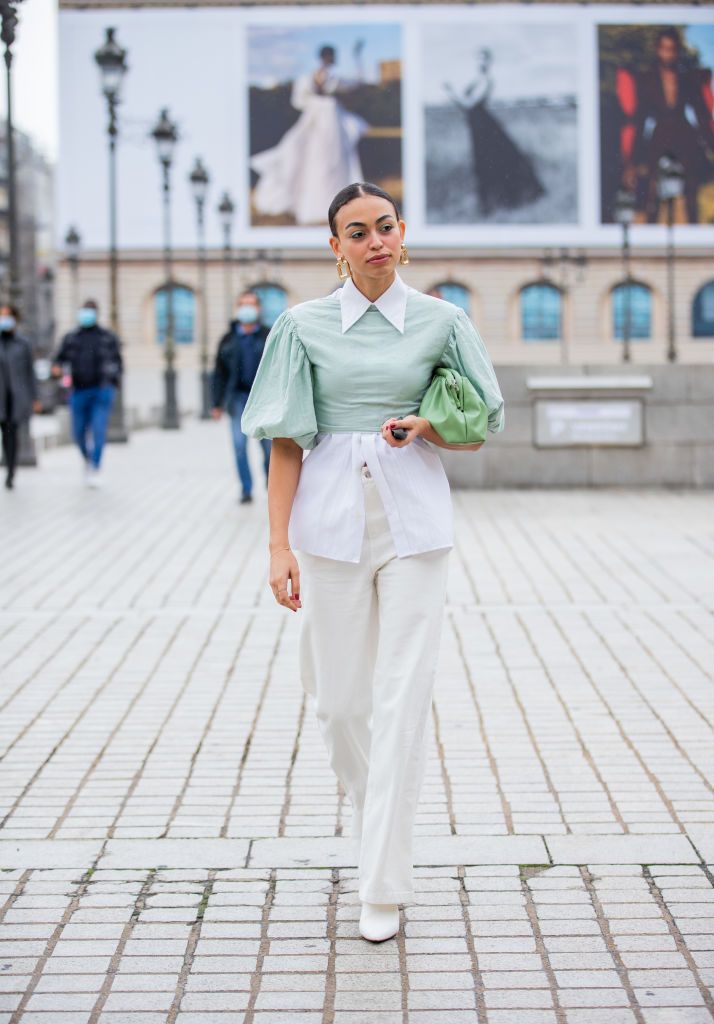 paris, france   september 29 a guest is seen wearing blouse, white button shirt, green bag outside victoriatomas during paris fashion week   womenswear spring summer 2021  day two on september 29, 2020 in paris, france photo by christian vieriggetty images