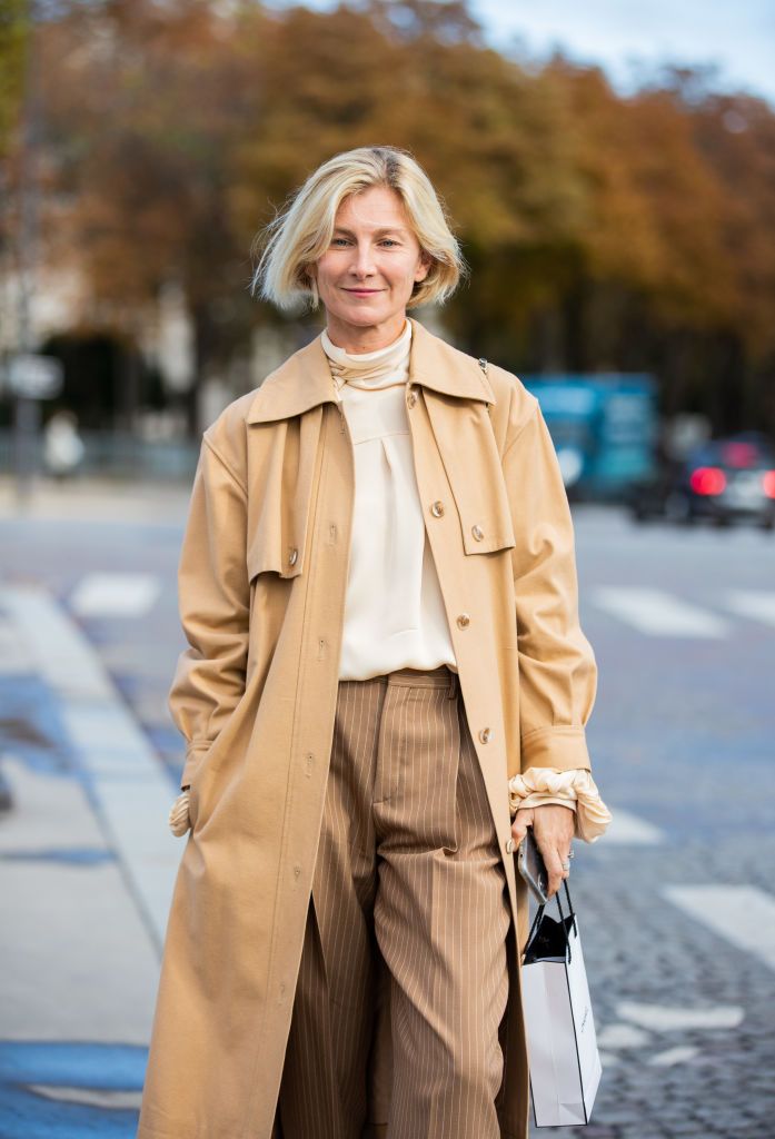paris, france   october 06 elizabeth von guttman seen wearing turtleneck, trench coat, striped pants outside chanel during paris fashion week   womenswear spring summer 2021  day nine on october 06, 2020 in paris, france photo by christian vieriggetty images