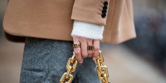 berlin, germany   october 13 sonia lyson is seen wearing dior rings, grey pants edited, white bottega veneta bag, white jumper and beige blazer other stories on october 13, 2020 in berlin, germany photo by christian vieriggetty images
