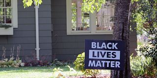black lives matter yard sign in residential neighborhood
