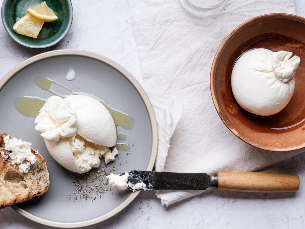 snack with fresh burrata cheese, table, top view