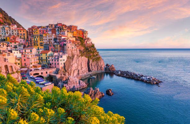 manarola, cinque terre, liguria, italy sunset over the town, view from a vantage point