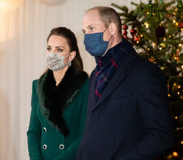 windsor, england   december 08 catherine, duchess of cambridge and prince william, duke of cambridge wait to thank local volunteers and key workers for the work they are doing during the coronavirus pandemic and over christmas in the quadrangle of windsor castle on december 8, 2020 in windsor, england photo by poolsamir husseinwireimage