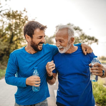 two men exercising outdoors