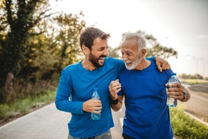 two men exercising outdoors