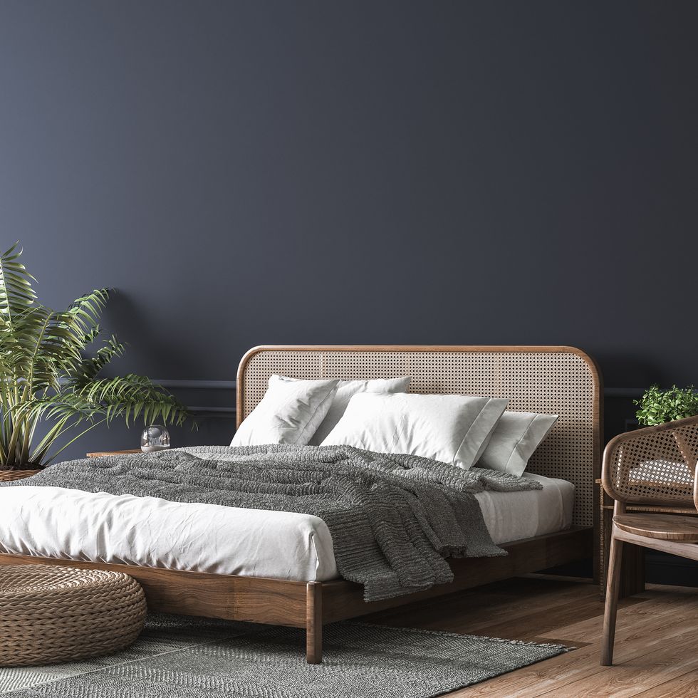 dark bedroom interior mockup, wooden rattan bed on empty dark wall background, scandinavian style, 3d render