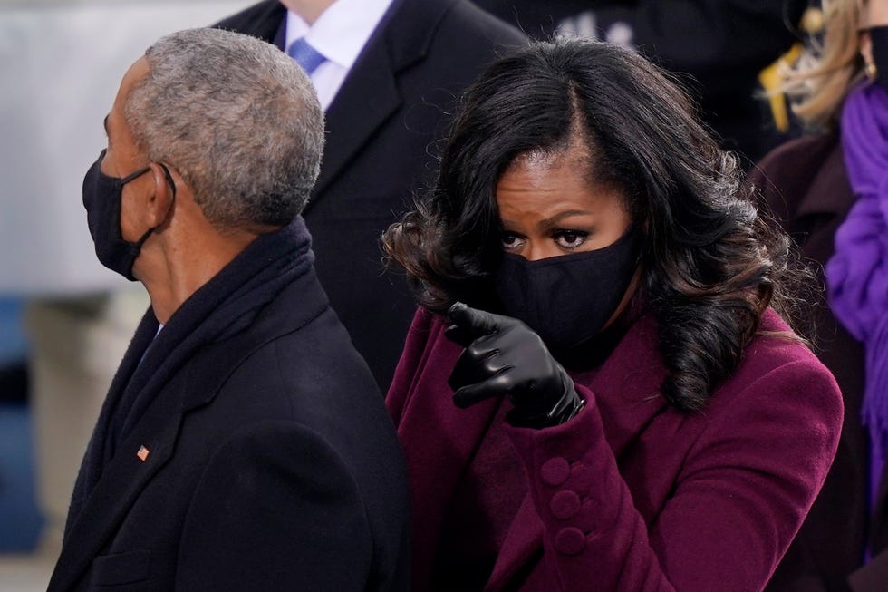 washington, dc   january 20 former us president barack obama and former first lady michelle obama arrive to the inauguration of us president elect joe biden on the west front of the us capitol on january 20, 2021 in washington, dc  during todays inauguration ceremony joe biden becomes the 46th president of the united states photo by drew angerergetty images