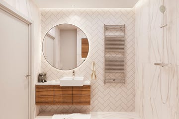 baño con azulejos en espiga