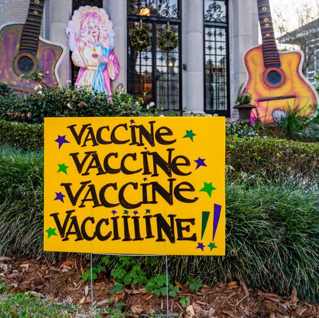 new orleans, louisiana   january 28 view of a home decorated in honor of dolly parton, with a vaccine, vaccine, vaccine, vacciiiine sign meant to evoke the lyrics of partons song jolene on january 28, 2021 in new orleans, louisiana due to the covid 19 pandemic cancelling traditional mardi gras activities, new orleanians are decorating their homes and businesses to resemble mardi gras floats photo by erika goldringgetty images
