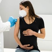 pregnant woman being vaccinated