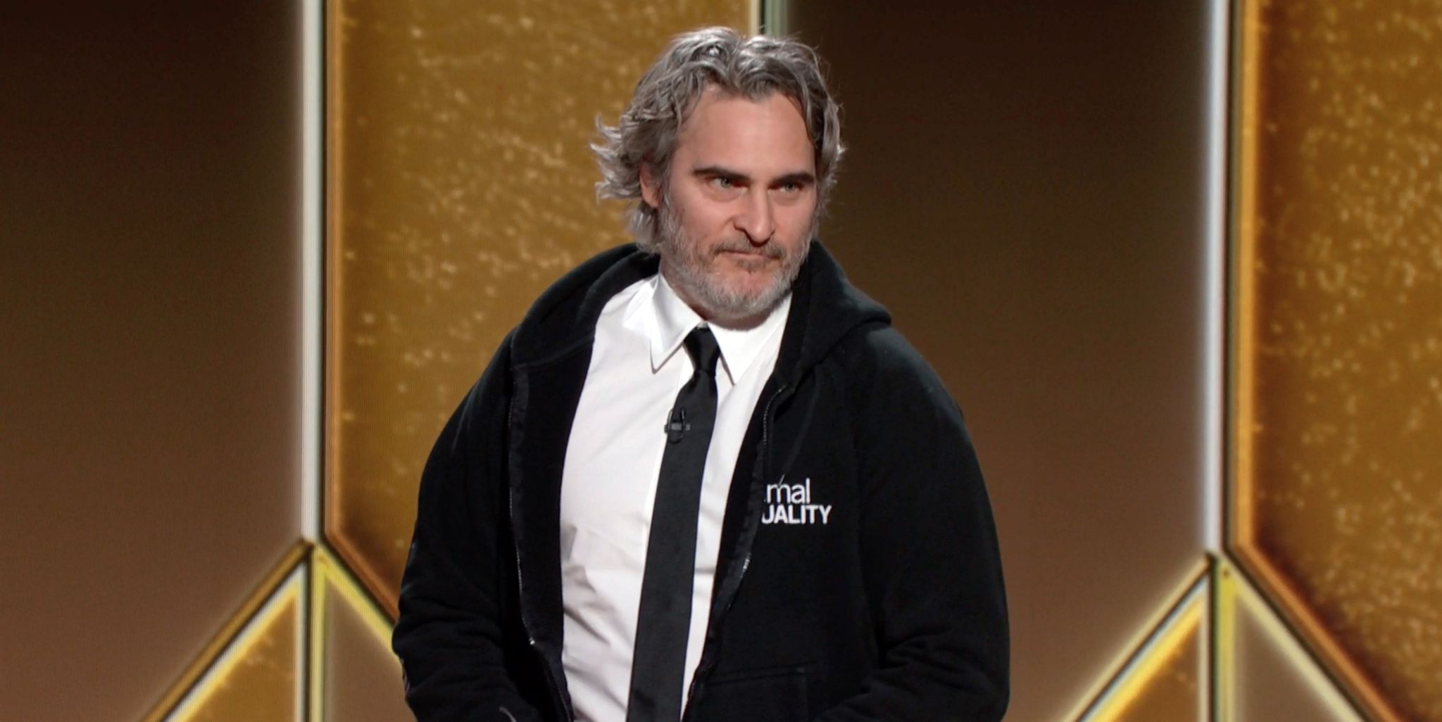 unspecified 78th annual golden globe awards    pictured in this screengrab released on february 28, l r joaquin phoenix speaks onstage at the 78th annual golden globe awards broadcast on february 28, 2021     photo by nbcnbcu photo bank via getty images