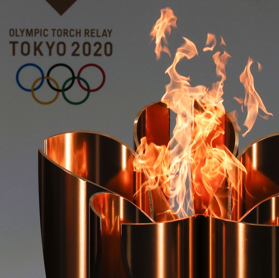 naraha, japan   march 25 the celebration cauldron is lit during the opening ceremony ahead of the the first day of the tokyo 2020 olympic torch relay at the j village during the tokyo olympic games torch relay on march 25, 2021 in naraha, fukushima, japan photo by kim kyung hoon   poolgetty images