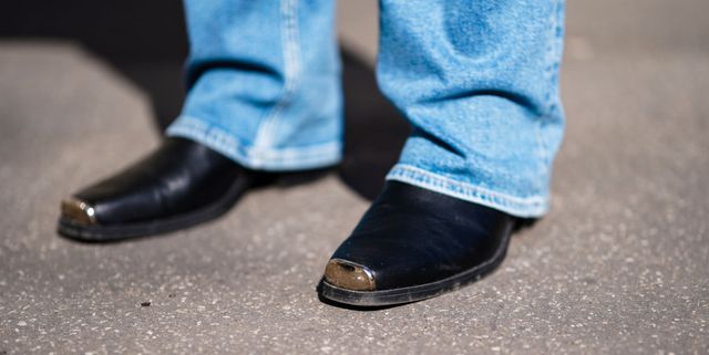paris, france   march 24 djebril irid mingodebergamo wears blue denim flared jeans pants from asos, black leather pointed shoes with metallic tip from zara, on march 24, 2021 in paris, france photo by edward berthelotgetty images
