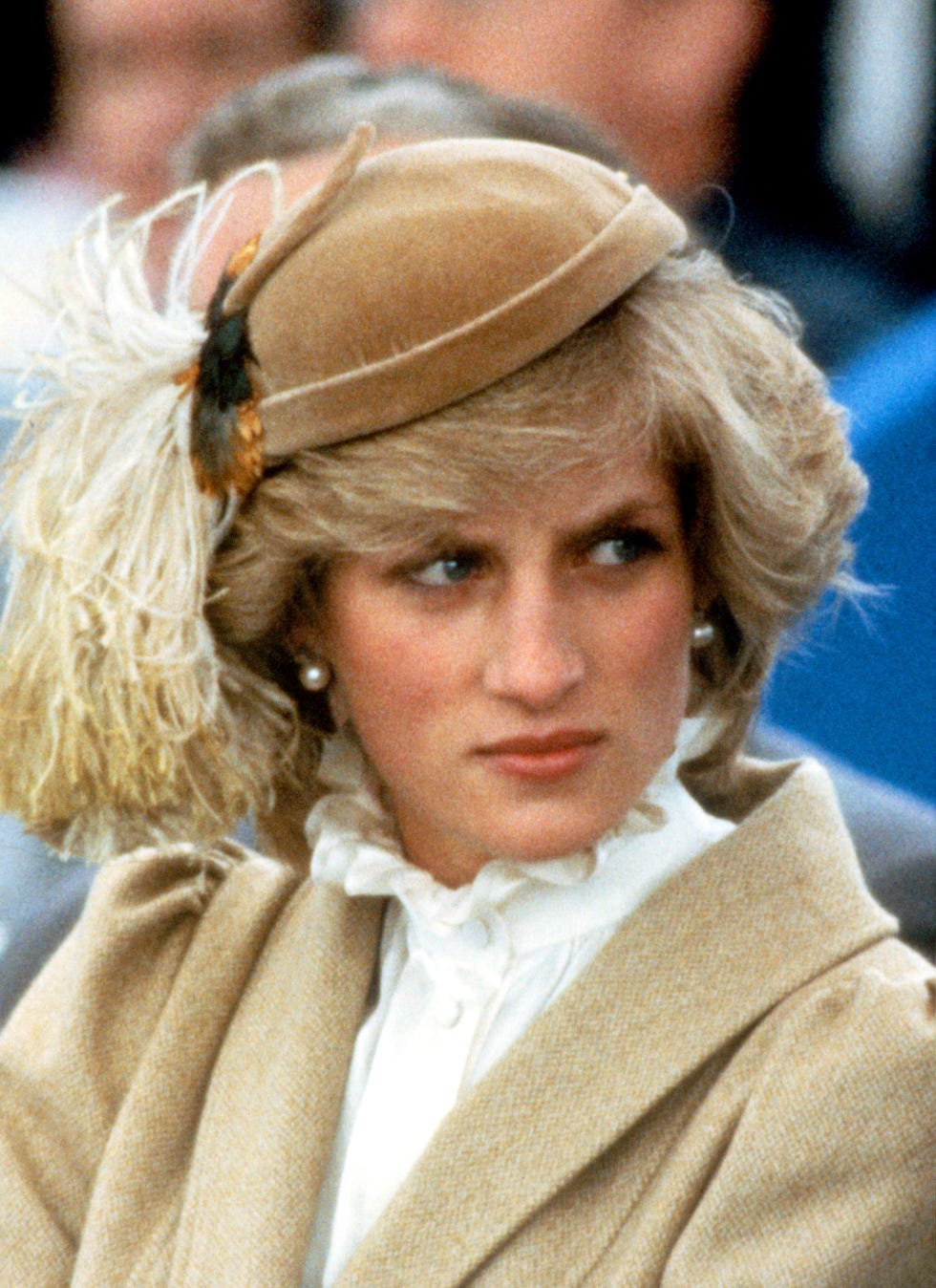 christchurch, new zealand   april 28 diana, princess of wales, wearing a camel coloured coat designed by caroline charles and a matching hat with a feather designed by john boyd, during a visit to an raf base on april 28, 1983 in christchurch, new zealand photo by anwar husseingetty images