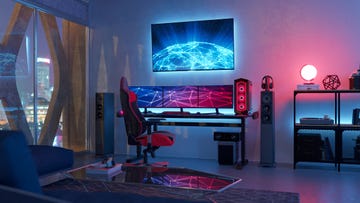 interior of a gamer room lit with neon lights